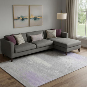 HomeRoots 9' X 12' Stylish Lavender and Ivory Abstract Washable Area Rug with UV Protection for Everyday Living 701092