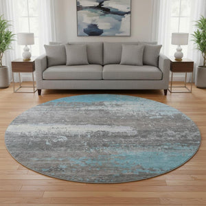 HomeRoots 8' Teal Gray & Ivory Abstract Washable Round Rug with UV Protection for Stylish Living Spaces 701102