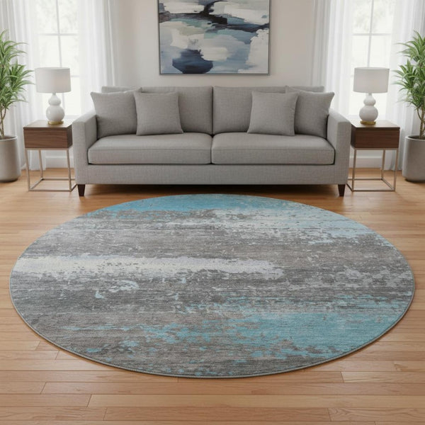 HomeRoots 8' Teal Gray & Ivory Abstract Washable Round Rug with UV Protection for Stylish Living Spaces 701102