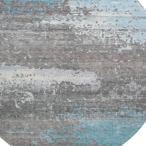 HomeRoots 8' Teal Gray & Ivory Abstract Washable Round Rug with UV Protection for Stylish Living Spaces 701102