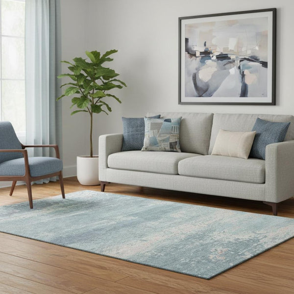 HomeRoots 5' X 8' Teal and Ivory Abstract Area Rug – Washable, UV Protected, Stain-Resistant for Busy Homes! 701113