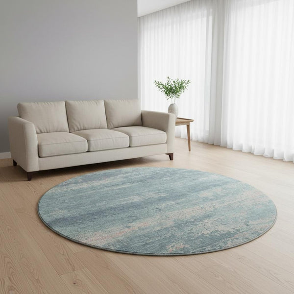 HomeRoots 8' Teal and Ivory Abstract Washable Round Rug - Durable, UV-Protected, Stylish for Any Space! 701114