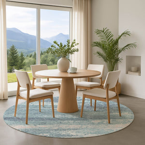 HomeRoots 8' Teal and Ivory Abstract Washable Round Rug - Durable, UV-Protected, Stylish for Any Space! 701114
