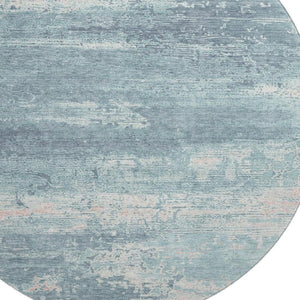 HomeRoots 8' Teal and Ivory Abstract Washable Round Rug - Durable, UV-Protected, Stylish for Any Space! 701114