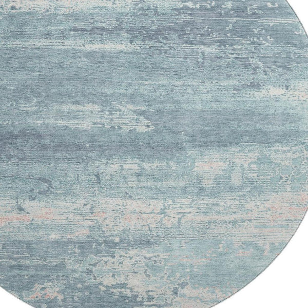 HomeRoots 8' Teal and Ivory Abstract Washable Round Rug - Durable, UV-Protected, Stylish for Any Space! 701114