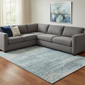 HomeRoots 8' X 10' Teal and Ivory Abstract Area Rug - Washable, UV Protected, Soft & Durable for Any Space 701115