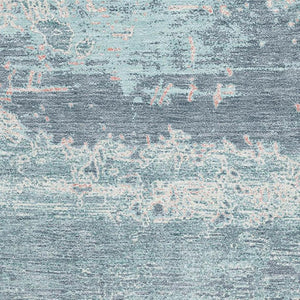 HomeRoots 10' X 14' Teal and Ivory Abstract Area Rug – Washable, UV-Protected, Stain-Resistant, and Non-Slip! 701117