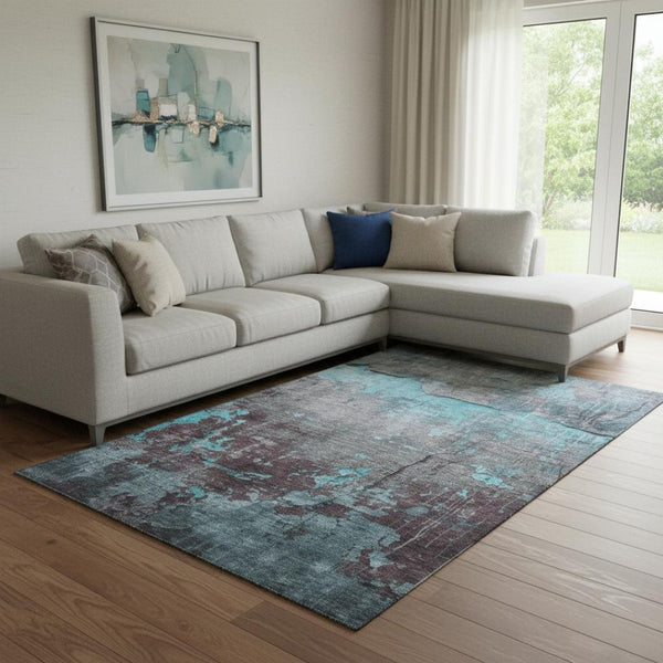 HomeRoots 8' X 10' Teal Gray Silver Abstract Area Rug - Washable, UV Protected, Stain Resistant, Non-Slip Backing 701169