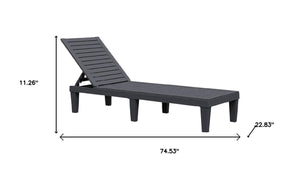 HomeRoots 75" Black Heavy Duty Chaise Lounge - Adjustable Outdoor Recliner with Faux Wood Finish & UV Protection 701232