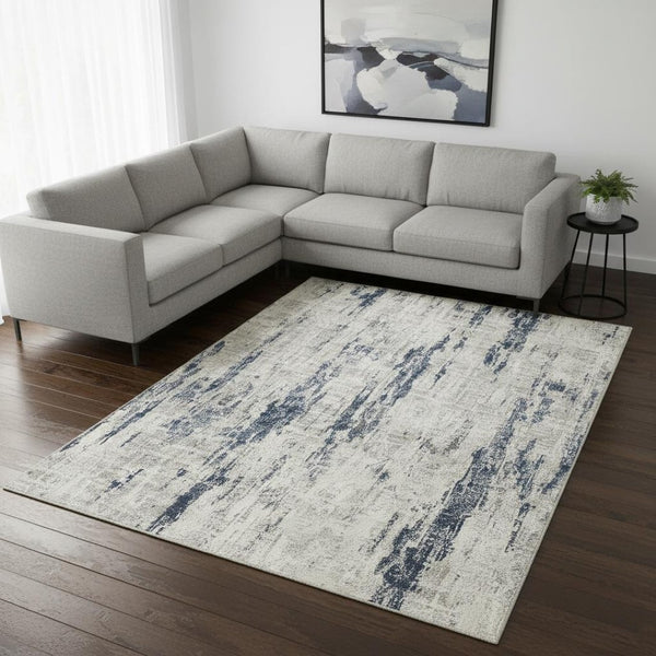 HomeRoots 8' Elegant Ivory and Slate Blue Abstract Washable Area Rug for Modern Living Spaces and Families 8' X 10' 701251