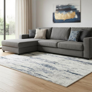 HomeRoots 9' Elegant Ivory and Slate Blue Abstract Area Rug - Washable, Stain-Resistant, Non-Slip Backing 9' X 12' 701252