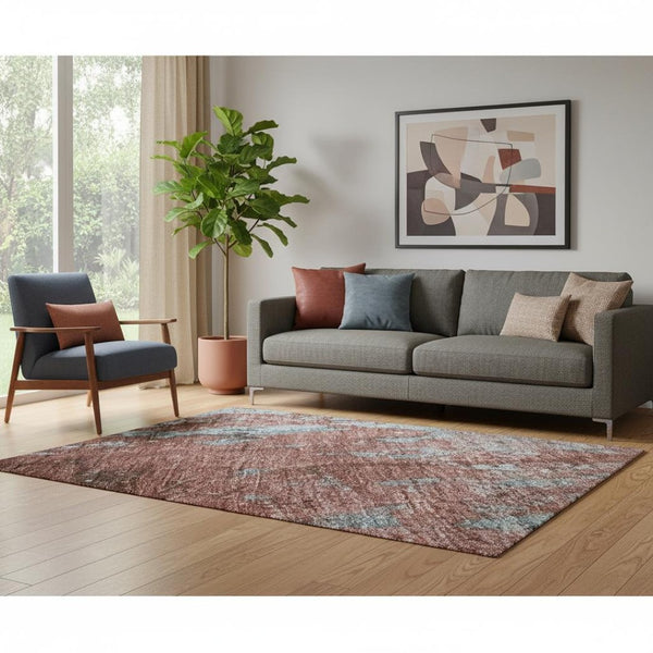 HomeRoots 5' X 8' Coral and Blue Abstract Area Rug - Washable, UV Protected, Durable, and Stylish Home Accent 701445