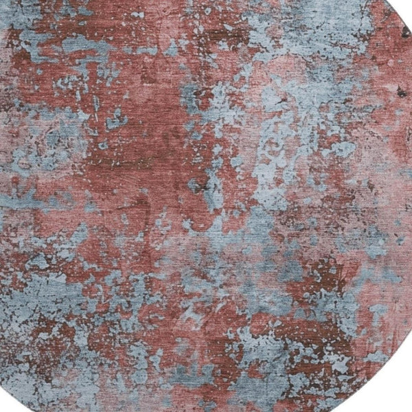 HomeRoots 8' Coral and Blue Abstract Round Rug - Washable, UV-Protected, Perfect for Busy Homes & Patios 701446