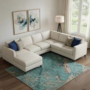 HomeRoots 9' X 12' Teal and Beige Abstract Area Rug - Washable, UV Protected, Durable & Perfect for Homes! 701478