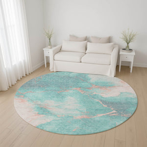 HomeRoots 8' Teal and Peach Abstract Washable Round Rug - Durable, UV-Protected, Perfect for High-Traffic Spaces! 701500