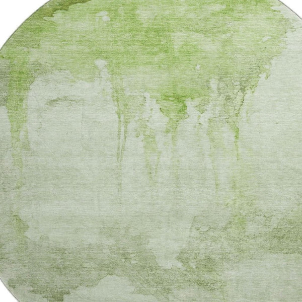 HomeRoots 8' Artichoke Green and Ivory Abstract Round Rug - Washable, UV-Protected, Non-Slip for Everyday Use 701512