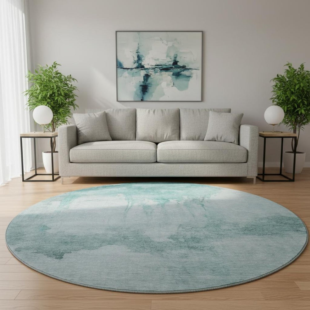 HomeRoots 8' Teal and Aqua Abstract Round Rug - Washable, UV Resistant, Modern Design for Vibrant Spaces 701530