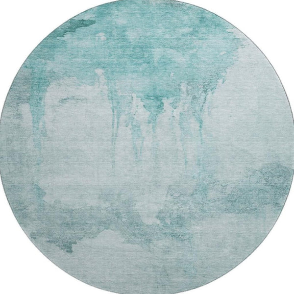HomeRoots 8' Teal and Aqua Abstract Round Rug - Washable, UV Resistant, Modern Design for Vibrant Spaces 701530