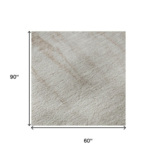 HomeRoots 5' X 8' Taupe And Beige Abstract Rug - Washable, UV-Protected, Durable Design for High-Traffic Areas 701535