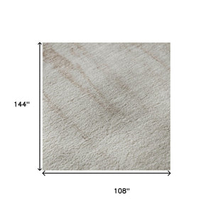 HomeRoots 9' X 12' Abstract Washable Area Rug in Taupe & Beige – Durable, UV-Protected & Family-Friendly Design 701538