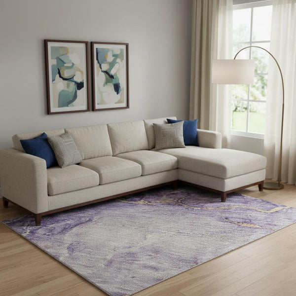 HomeRoots 10' X 14' Abstract Washable Area Rug in Purple, Gold & Ivory - Stain Resistant & UV Protected Design 701557