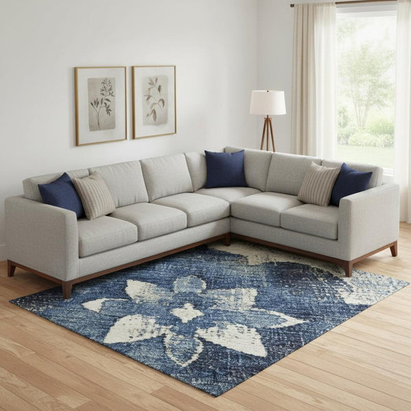 HomeRoots 10' Navy Blue and Ivory Floral Washable Area Rug with UV Protection for Stylish, Durable Living Spaces 701605