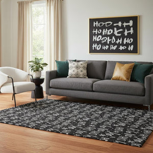 HomeRoots 5' X 8' Black And Ivory Abstract Geometric Washable Area Rug - Stylish, Durable, UV Protected Decor 701788