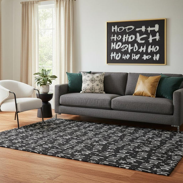 HomeRoots 5' X 8' Black And Ivory Abstract Geometric Washable Area Rug - Stylish, Durable, UV Protected Decor 701788