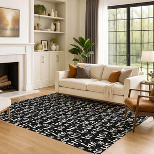 HomeRoots 9' X 12' Black And Ivory Abstract Geometric Area Rug - Washable, UV Protected, Durable & Stylish! 701791