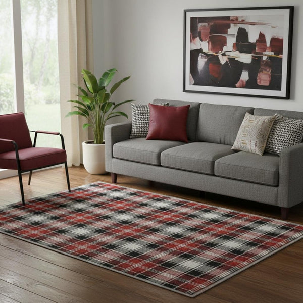 HomeRoots 5' X 8' Modern Abstract Geometric Area Rug in Black, Red & White - Washable, UV Protected & Non-Slip 701872