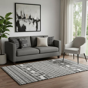 HomeRoots 5' X 8' Abstract Geometric Area Rug in Gray, Black & Ivory - Washable, UV Protected, Stain Resistant 701980