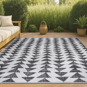 HomeRoots 8' X 10' Stylish Ivory and Black Geometric Rug - Durable Indoor Outdoor Decor for Any Space! 702567