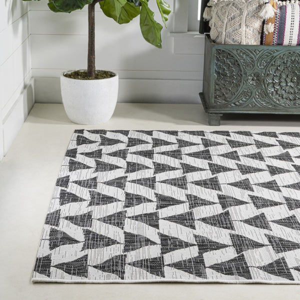 HomeRoots 8' X 10' Stylish Ivory and Black Geometric Rug - Durable Indoor Outdoor Decor for Any Space! 702567