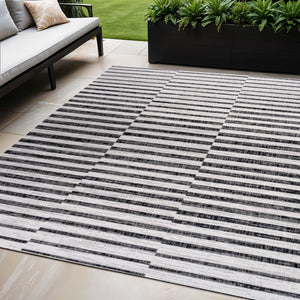 HomeRoots 5' Stylish Ivory and Black Striped Area Rug - Durable Indoor/Outdoor Design for All Spaces 702608