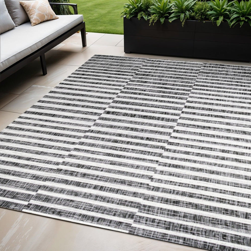 HomeRoots 5' Striped Indoor Outdoor Area Rug – Black & Ivory, Durable, Weather-Resistant, Versatile Design! 702614