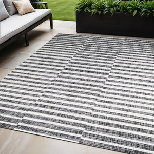 HomeRoots 5' Striped Indoor Outdoor Area Rug – Black & Ivory, Durable, Weather-Resistant, Versatile Design! 702614