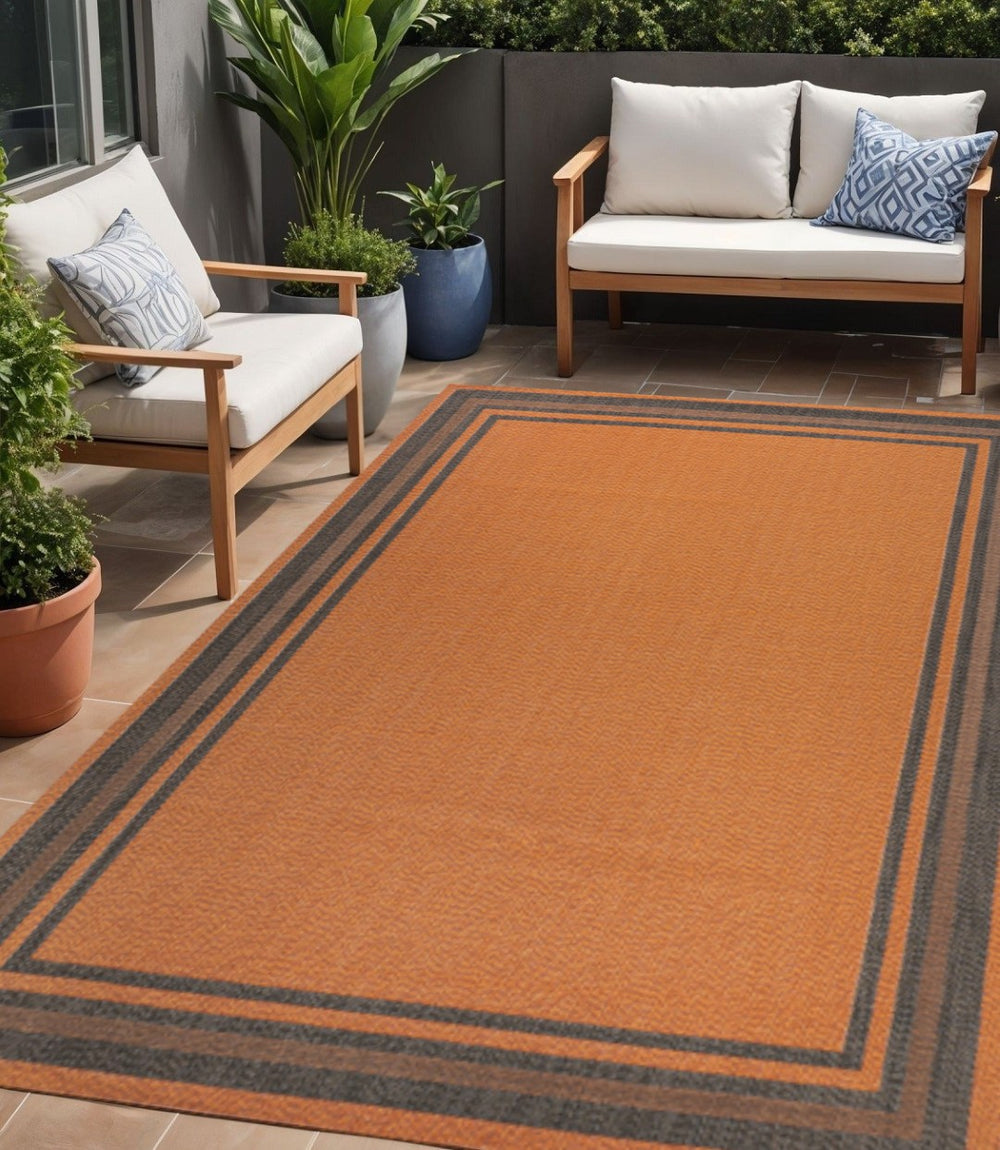 HomeRoots 5' Striking Orange and Dark Gray Striped Indoor-Outdoor Area Rug - Durable, Stylish, and Easy Care! 702637