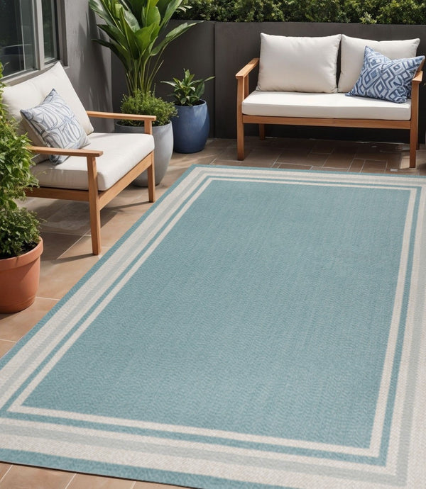 HomeRoots 5' Aqua and Beige Striped Area Rug – Stylish Indoor/Outdoor Carpet for Versatile Coastal Decor 702640