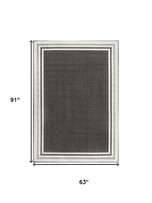 HomeRoots 5' Versatile Black and Cream Striped Area Rug for Indoor and Outdoor Spaces – Durable & Stylish! 702643