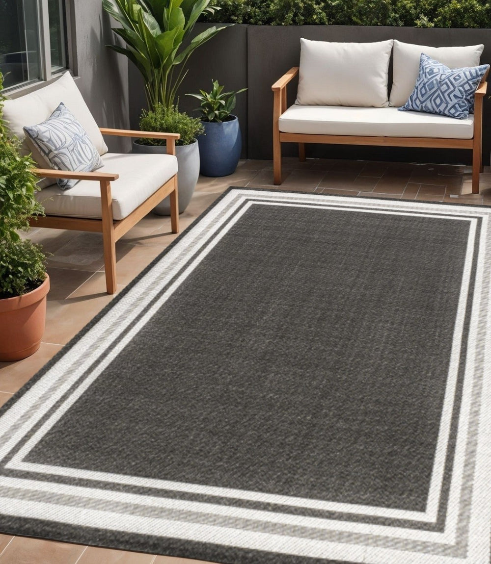 HomeRoots 5' Versatile Black and Cream Striped Area Rug for Indoor and Outdoor Spaces – Durable & Stylish! 702643
