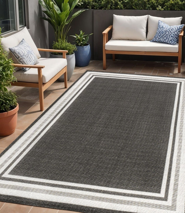 HomeRoots 5' Versatile Black and Cream Striped Area Rug for Indoor and Outdoor Spaces – Durable & Stylish! 702643