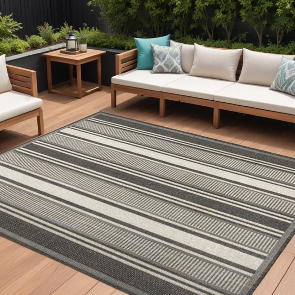 HomeRoots 8' X 10' Black and Cream Striped Area Rug - Durable, Stylish Design for Indoor & Outdoor Use! 702650