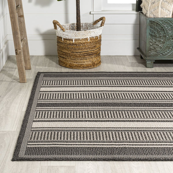 HomeRoots 8' X 10' Black and Cream Striped Area Rug - Durable, Stylish Design for Indoor & Outdoor Use! 702650