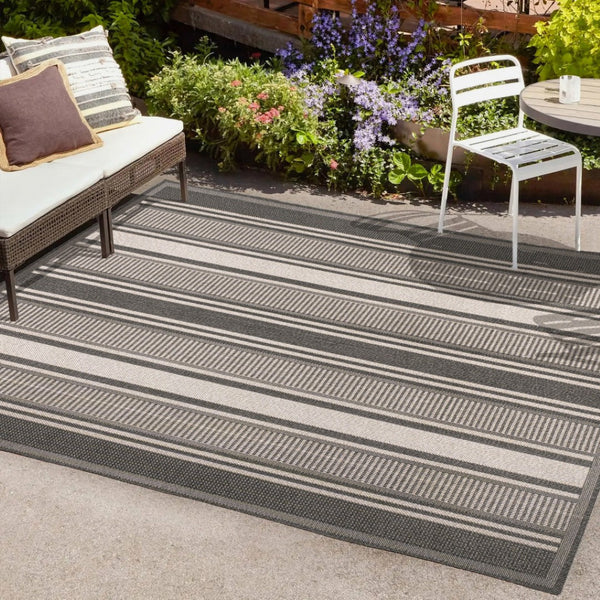 HomeRoots 8' X 10' Black and Cream Striped Area Rug - Durable, Stylish Design for Indoor & Outdoor Use! 702650