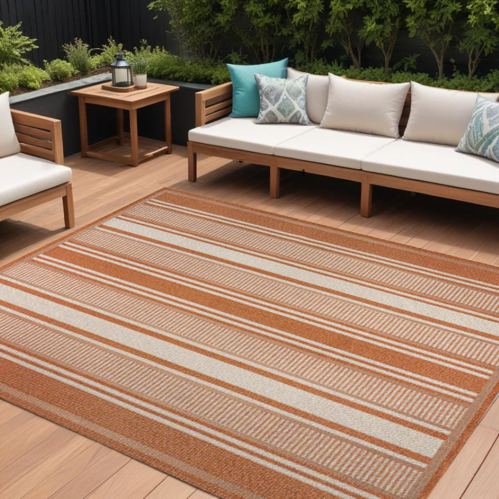 HomeRoots 8' X 10' Striped Orange and Cream Indoor Outdoor Rug - Durable, Stylish, and Versatile Floor Covering 702653