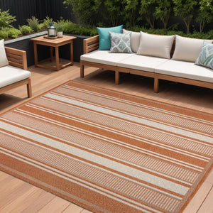 HomeRoots 8' X 10' Striped Orange and Cream Indoor Outdoor Rug - Durable, Stylish, and Versatile Floor Covering 702653