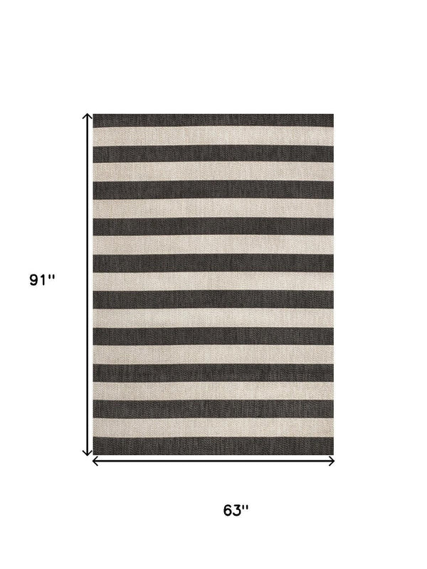HomeRoots 5' Black and Beige Striped Area Rug - Stylish Indoor Outdoor Accent for Living Spaces & Patios 702658