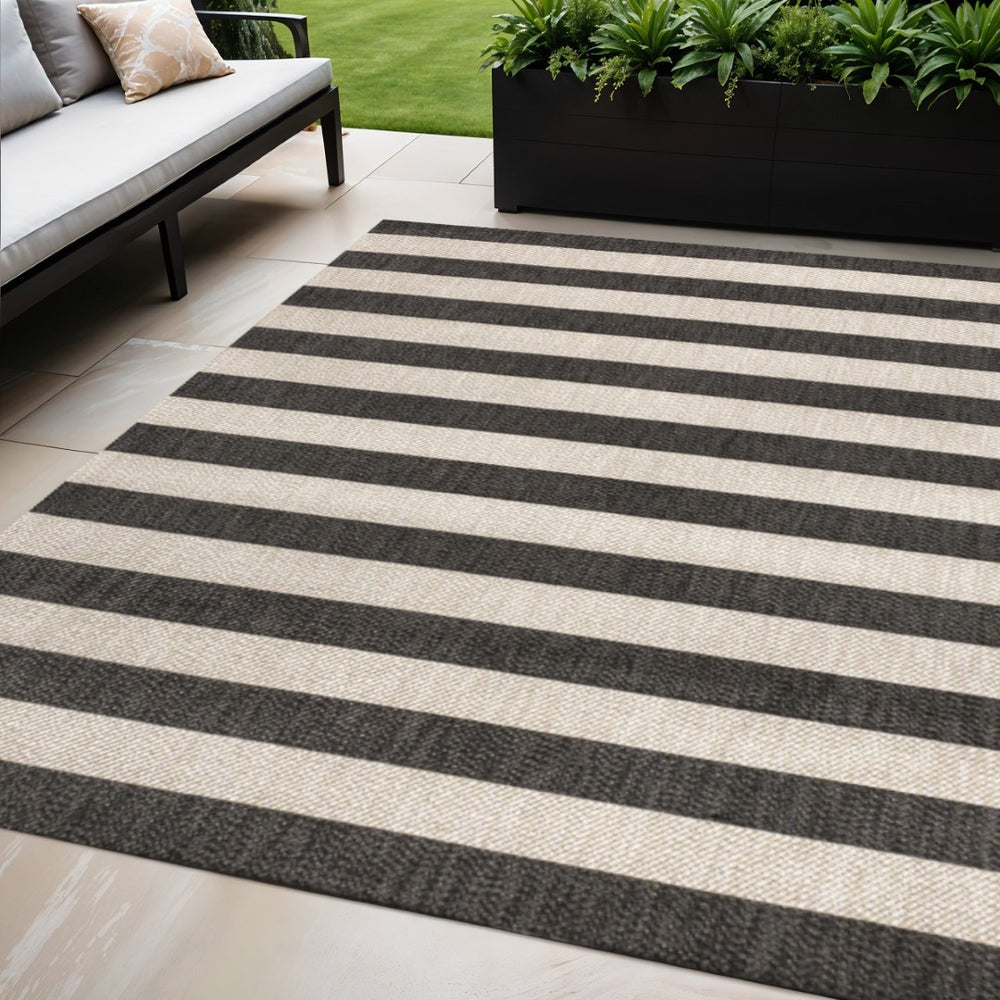 HomeRoots 5' Black and Beige Striped Area Rug - Stylish Indoor Outdoor Accent for Living Spaces & Patios 702658