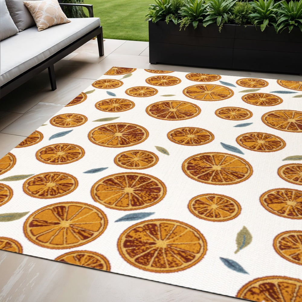 HomeRoots 5' Orange and Cream Polka Dot Area Rug - Stylish Indoor/Outdoor Comfort with Weather-Resistant Design 702690