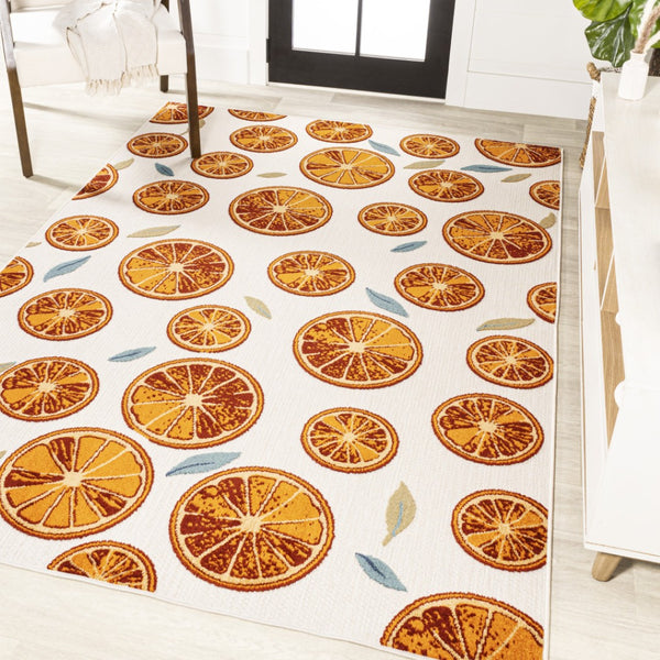 HomeRoots 5' Orange and Cream Polka Dot Area Rug - Stylish Indoor/Outdoor Comfort with Weather-Resistant Design 702690
